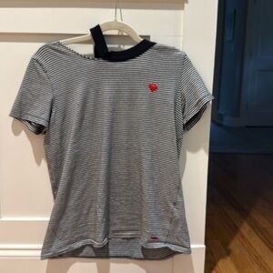 Super cute black and white tee with heart logo and fun neckline